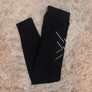 Black leggings with white detailing on the sides